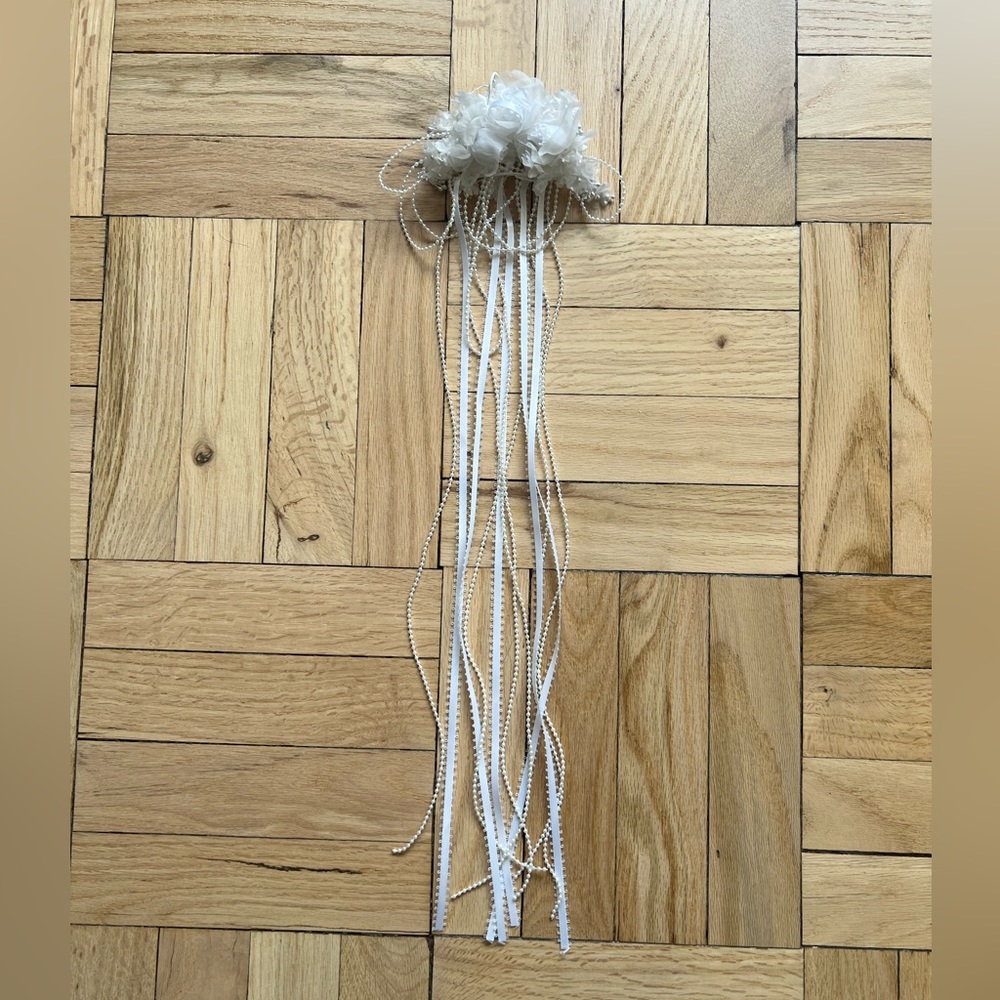 Custom-made hair piece. Worn once. Perfect for a flower girl. 21” long.